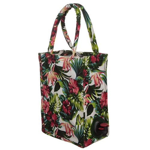 Bag in box med mönster av blommor och blad. En bag in box i form av en väska.